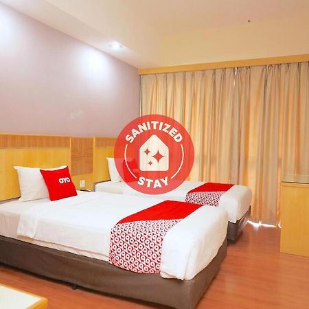 Oyo 89866 Houz Inn Бинтулу Экстерьер фото