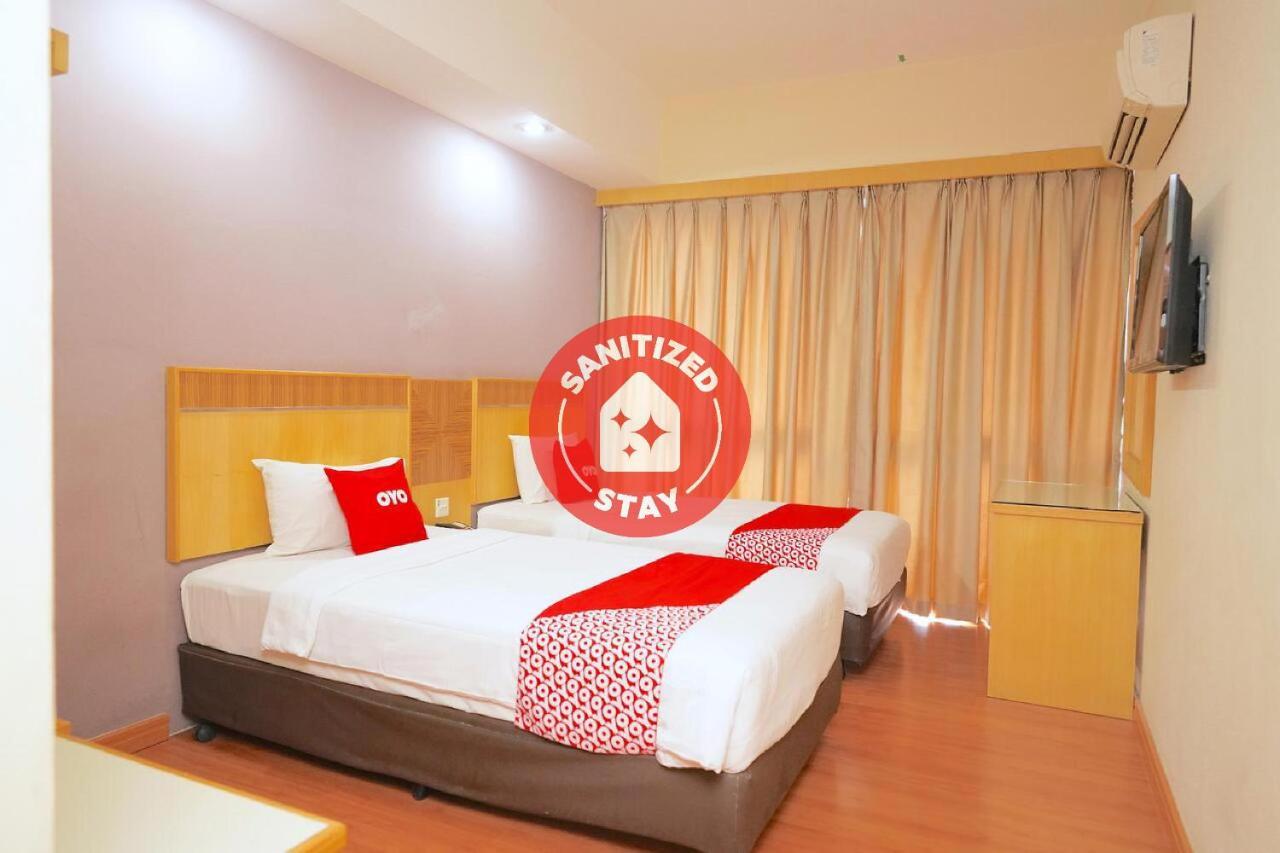 Oyo 89866 Houz Inn Бинтулу Экстерьер фото