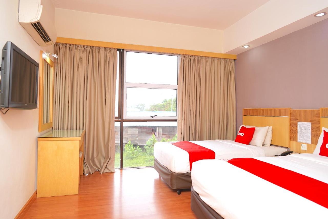 Oyo 89866 Houz Inn Бинтулу Экстерьер фото