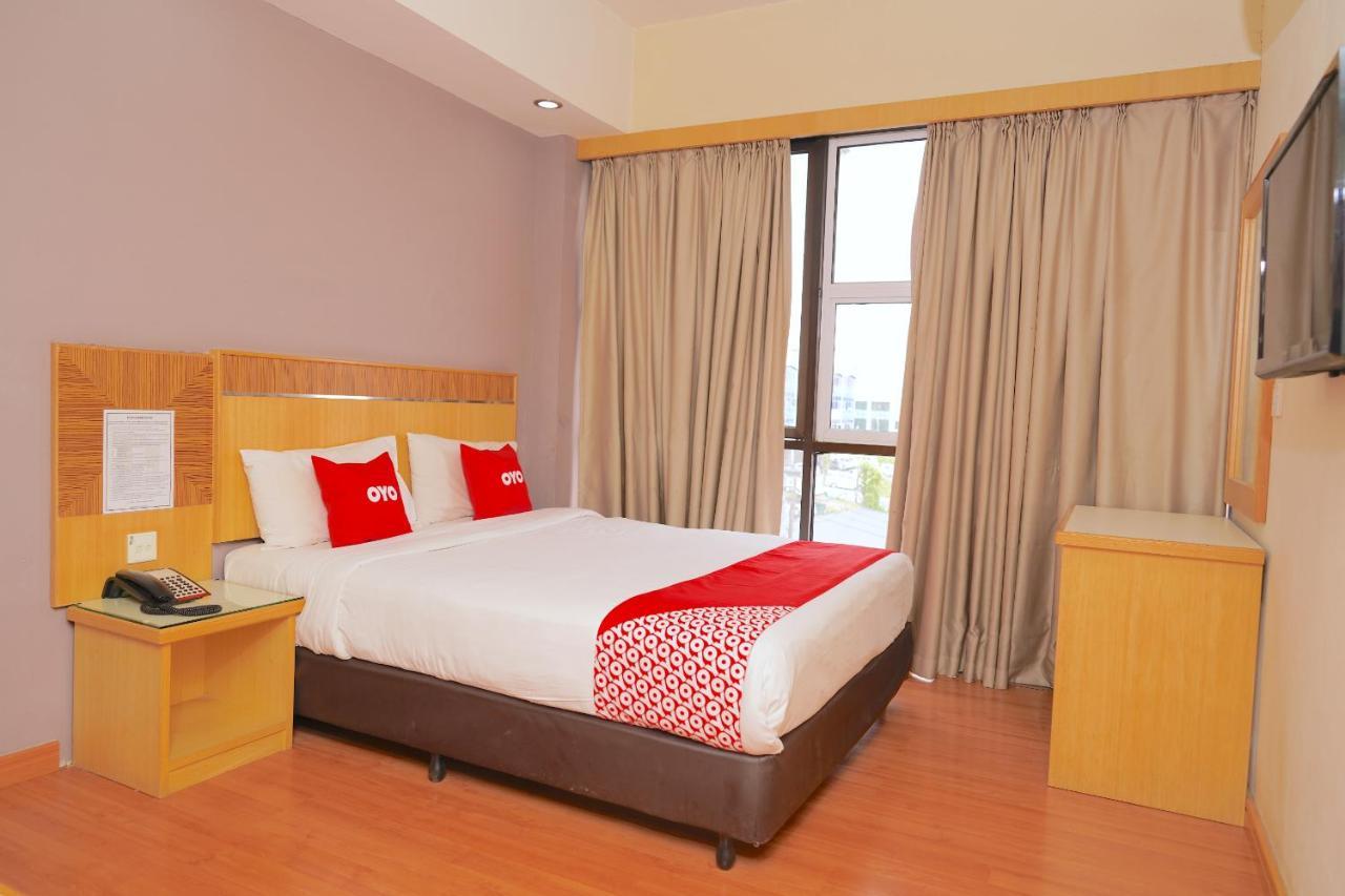 Oyo 89866 Houz Inn Бинтулу Экстерьер фото