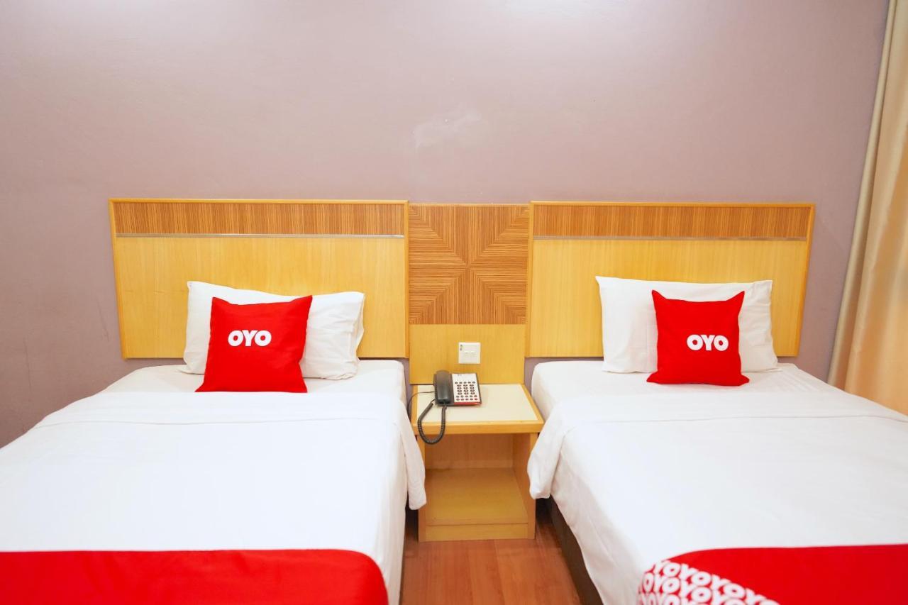 Oyo 89866 Houz Inn Бинтулу Экстерьер фото