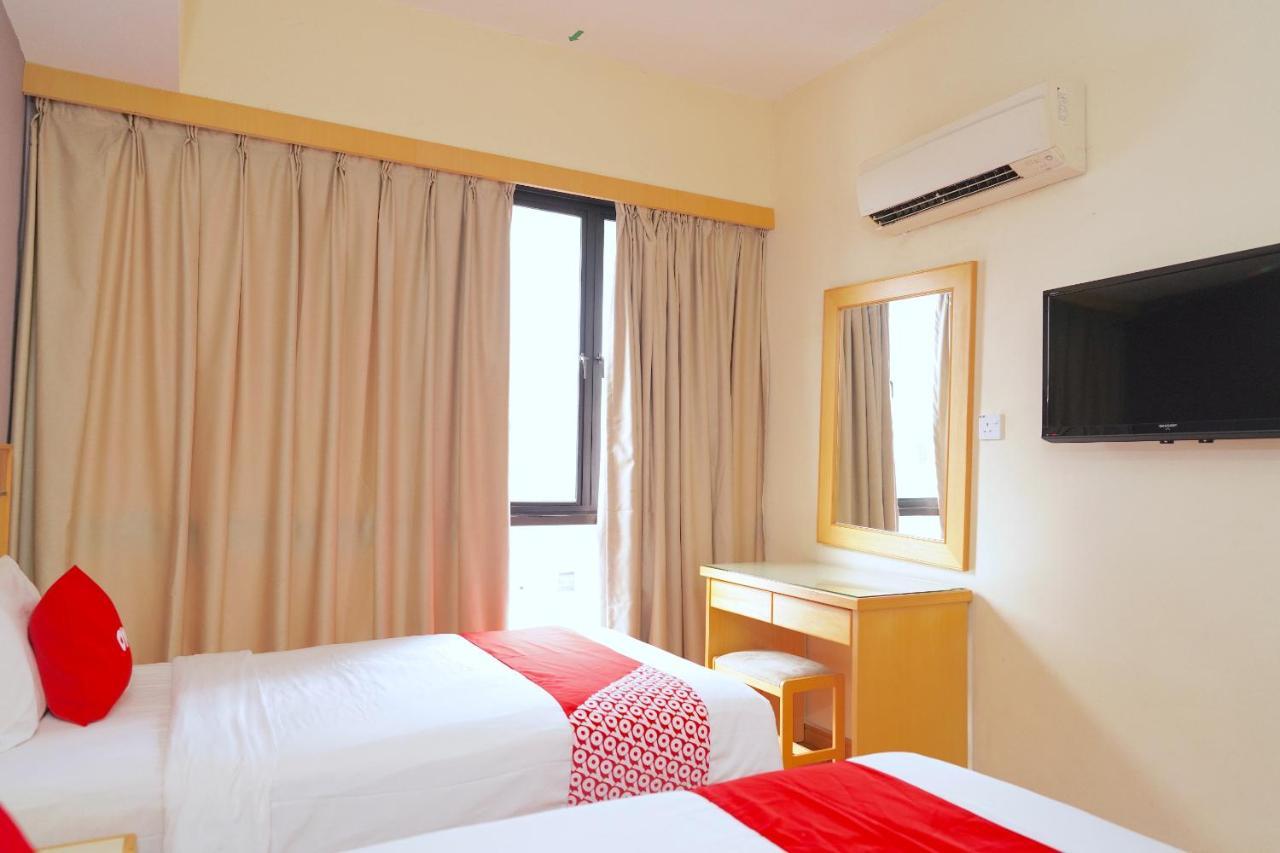 Oyo 89866 Houz Inn Бинтулу Экстерьер фото