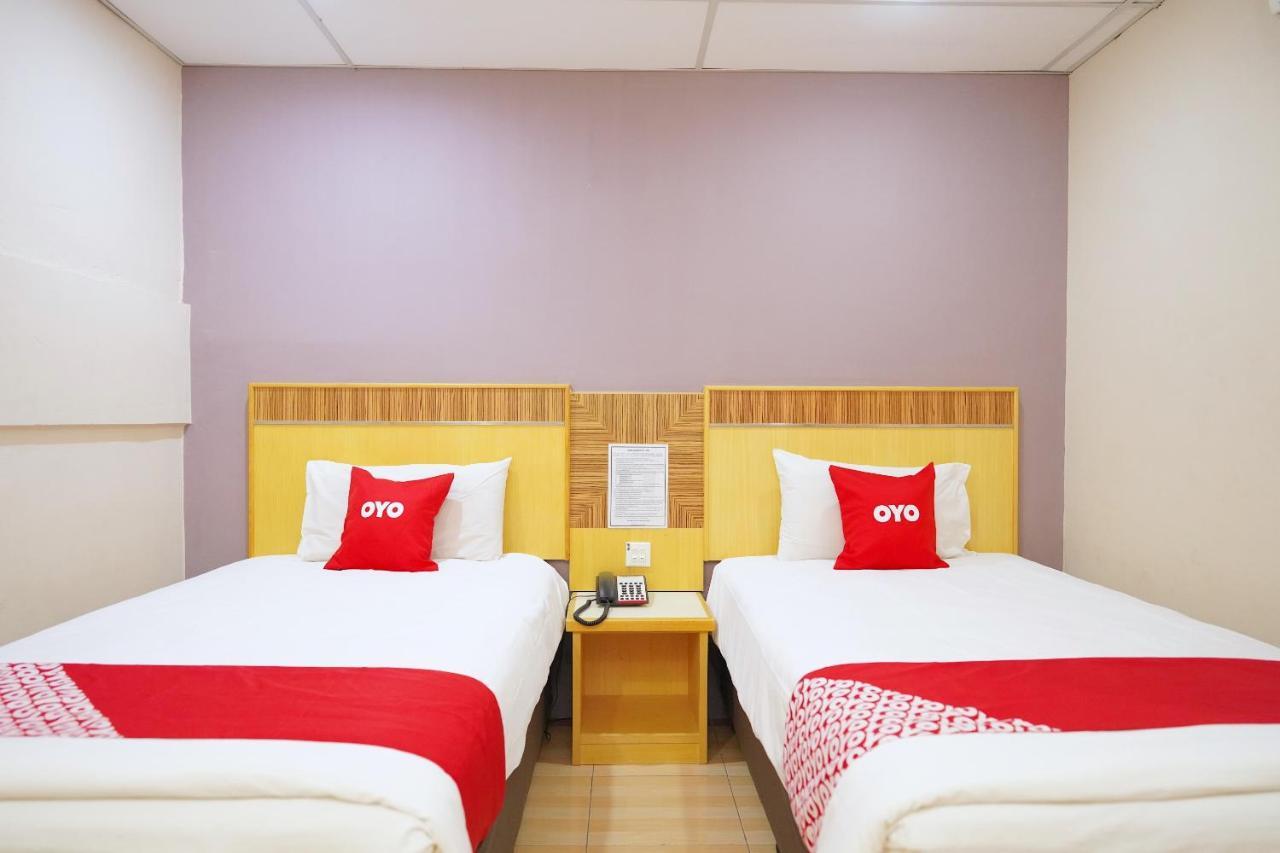 Oyo 89866 Houz Inn Бинтулу Экстерьер фото