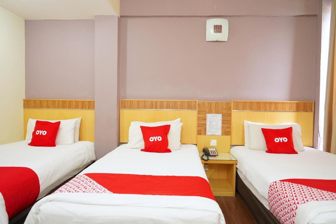 Oyo 89866 Houz Inn Бинтулу Экстерьер фото