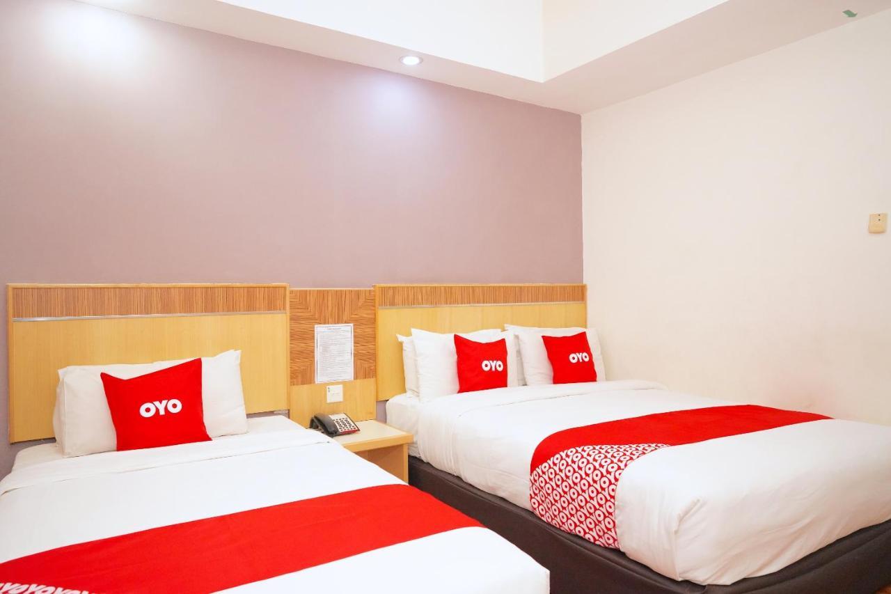 Oyo 89866 Houz Inn Бинтулу Экстерьер фото