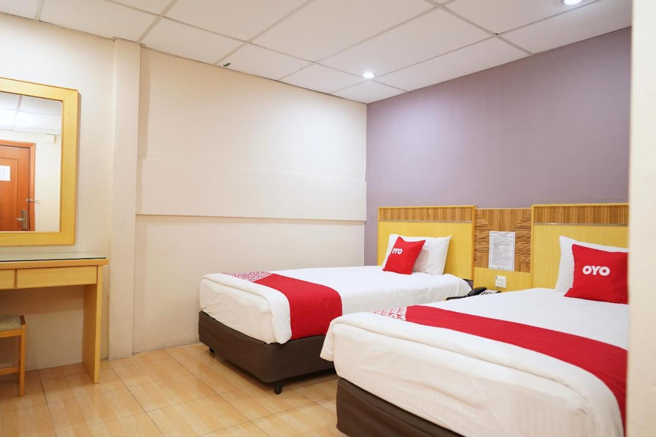 Oyo 89866 Houz Inn Бинтулу Экстерьер фото