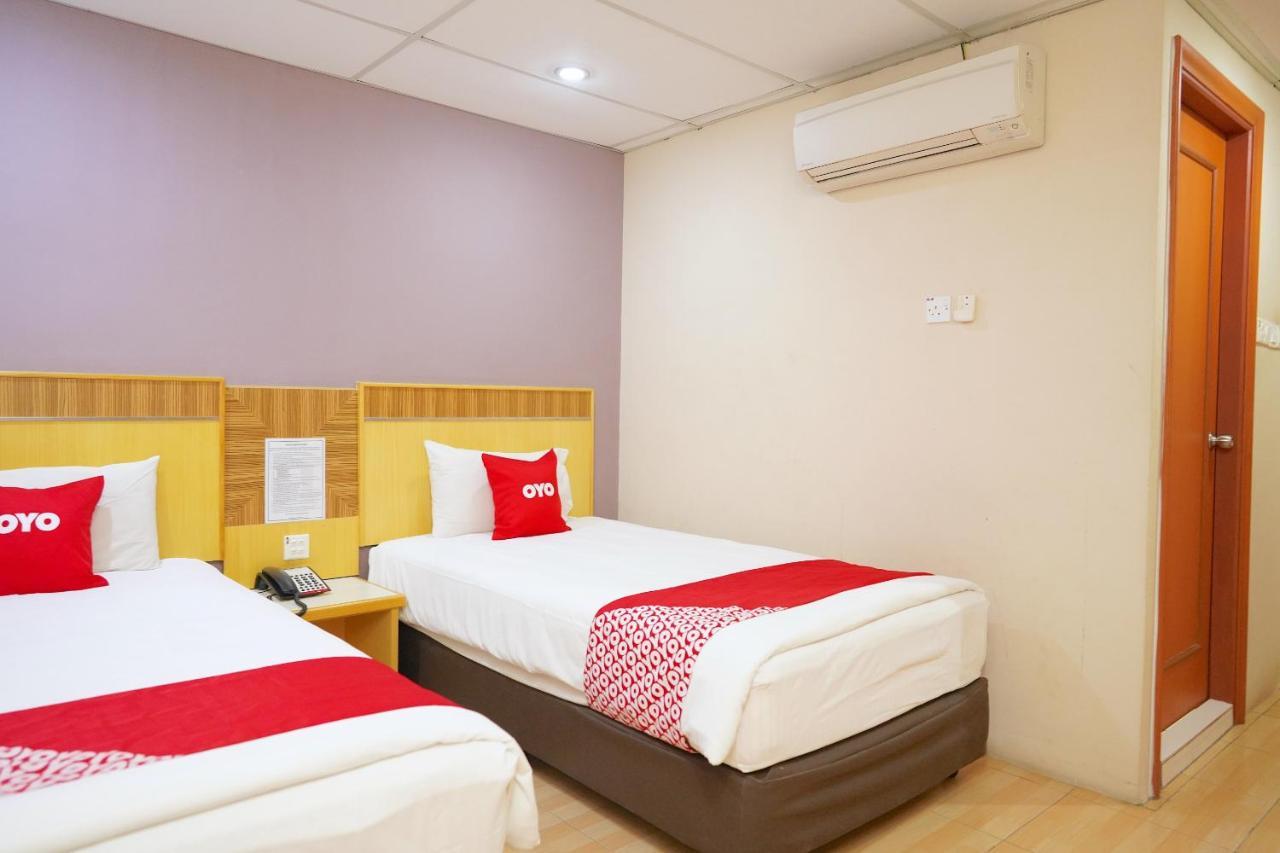 Oyo 89866 Houz Inn Бинтулу Экстерьер фото